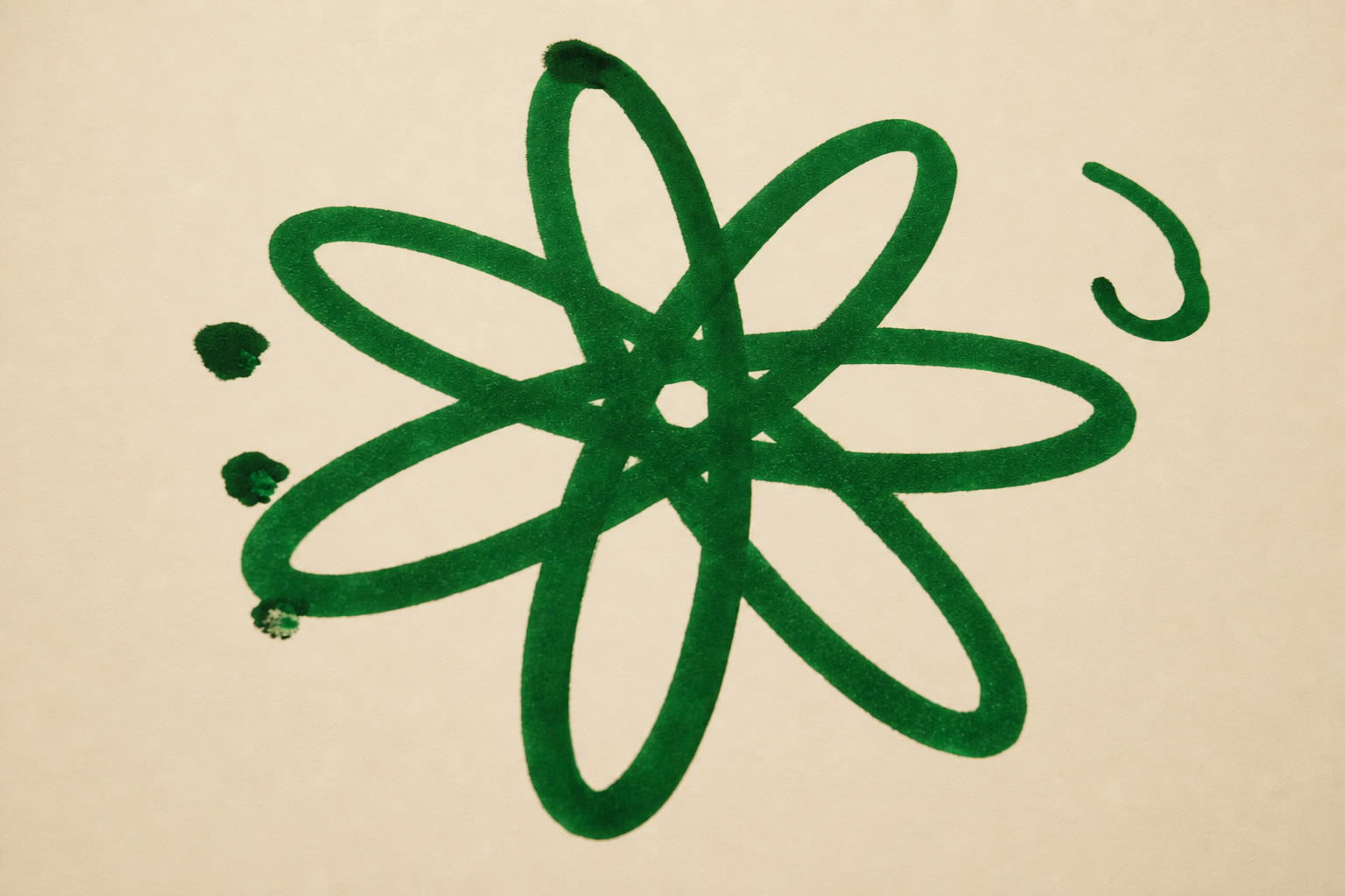 Green looped rosette drawn with a marker