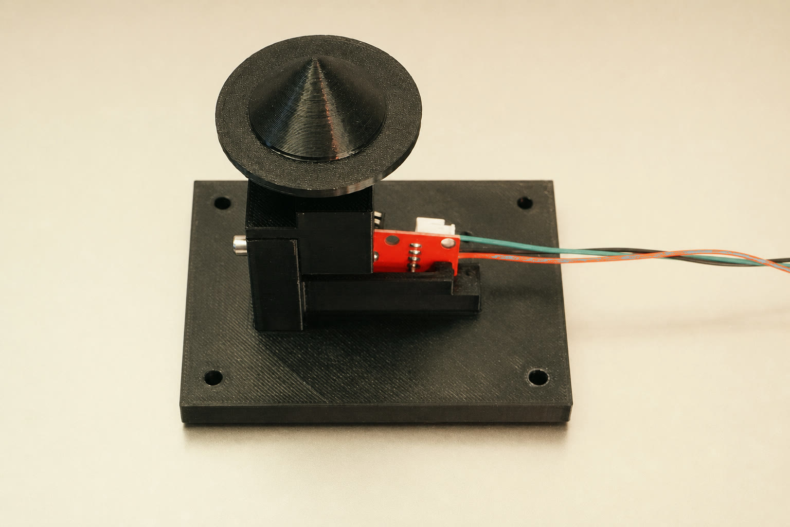 3D-printed cone touch station with a fail-safe switch